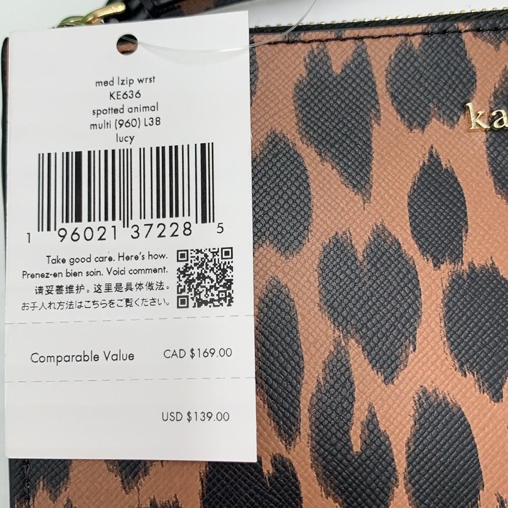 Kate Spade Lucy Medium L-Zip Wristlet
COLOR:
Multi
NWT - Picture 3 of 16